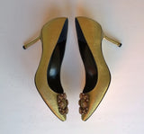 Manolo Blahnik Hangisi 70 Gold Heels with rhinestone buckle