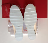 Roger Vivier Viv Gommette Cream Patent Shoes with rubber wedge flats